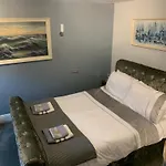 Apartman One, The Carriage House, *