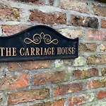Apartman One, The Carriage House, *
