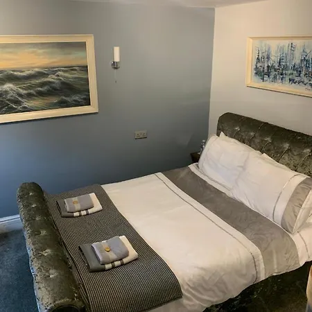 Apartman One, The Carriage House, *